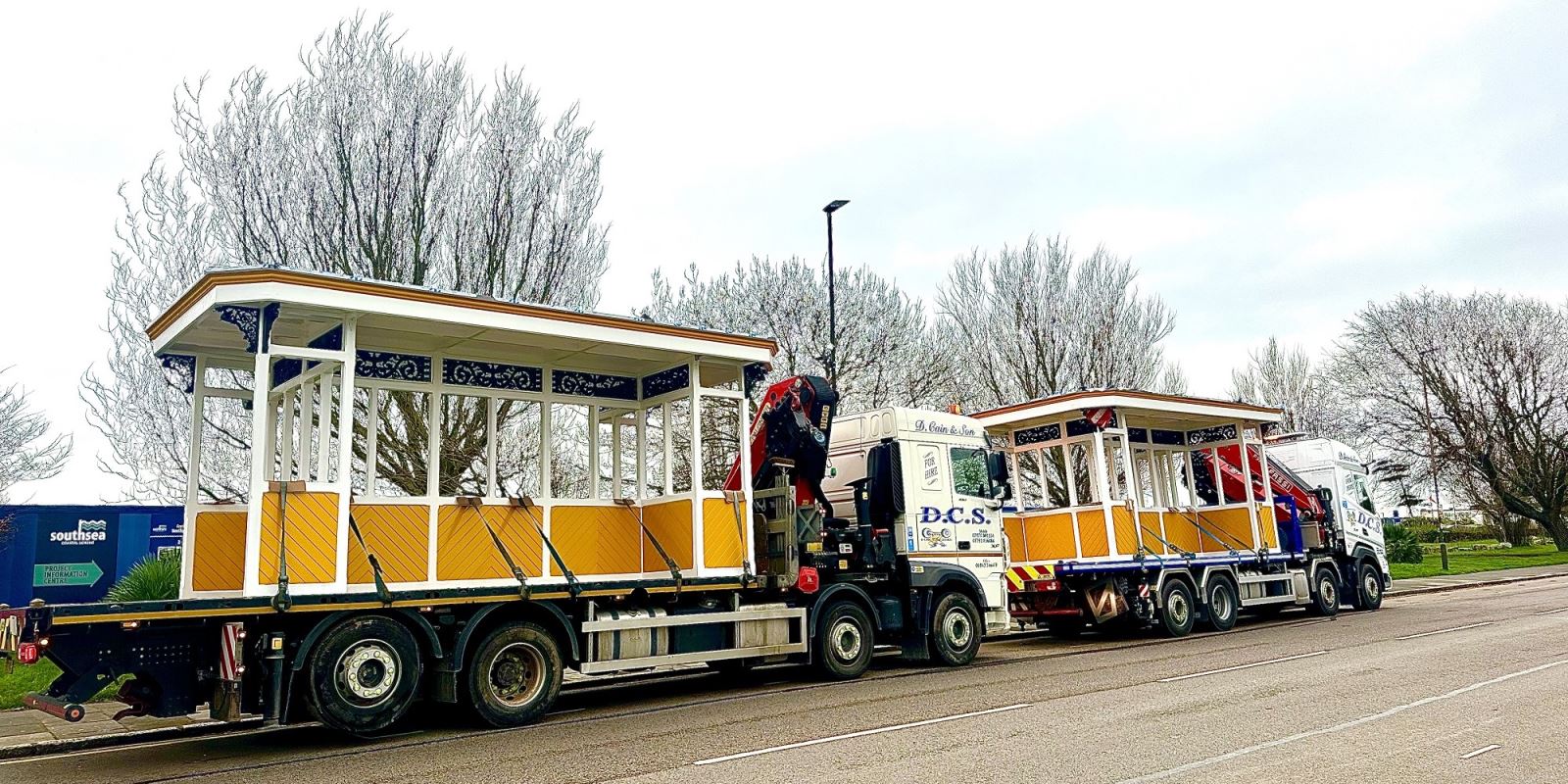 The shelters on the back of trucks being transported along Southsea